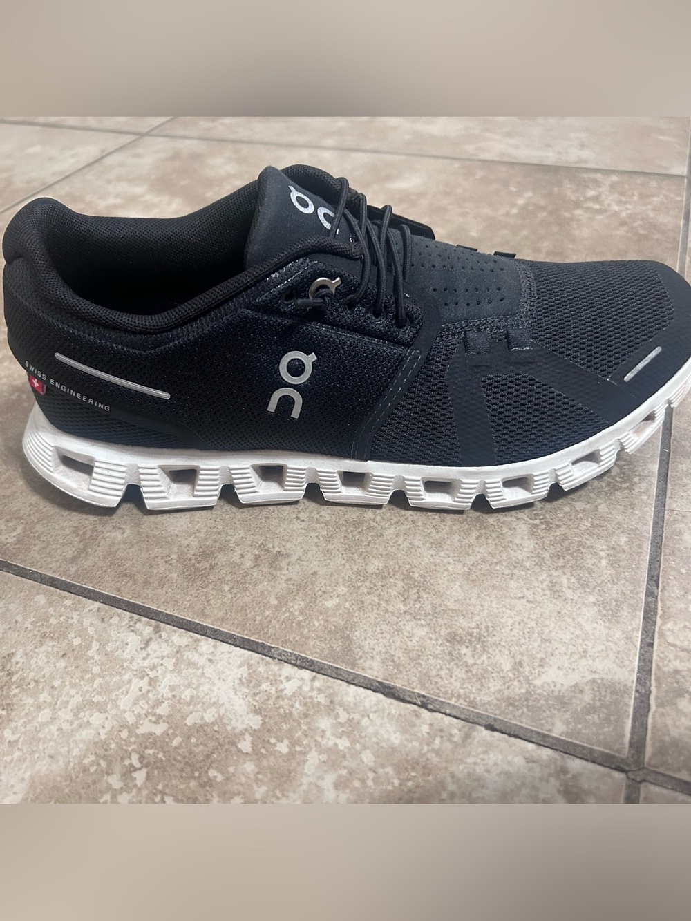 On Running Women’s Black Athletic Shoe with White Cloudtec Sole